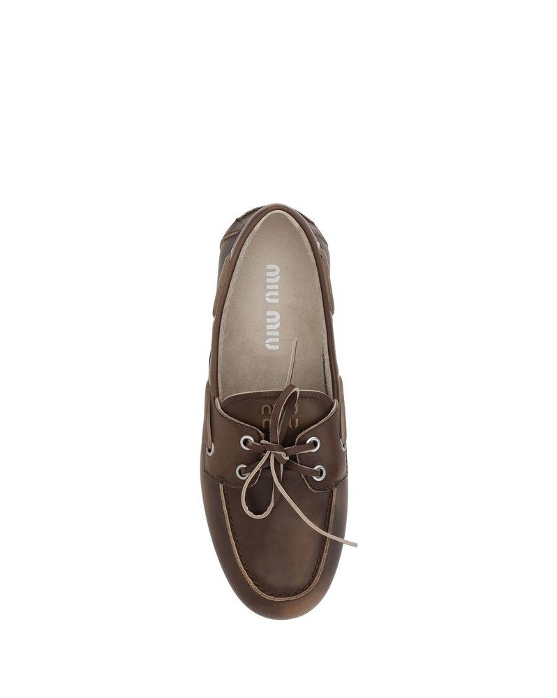 Miu Miu Brown Calf Leather Bos Taurus Slip On Loafers Glam Steals