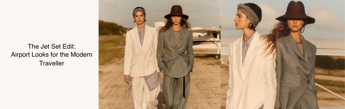Two women wearing suits