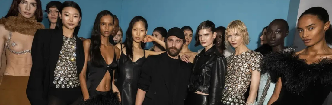 David Koma with fashion models