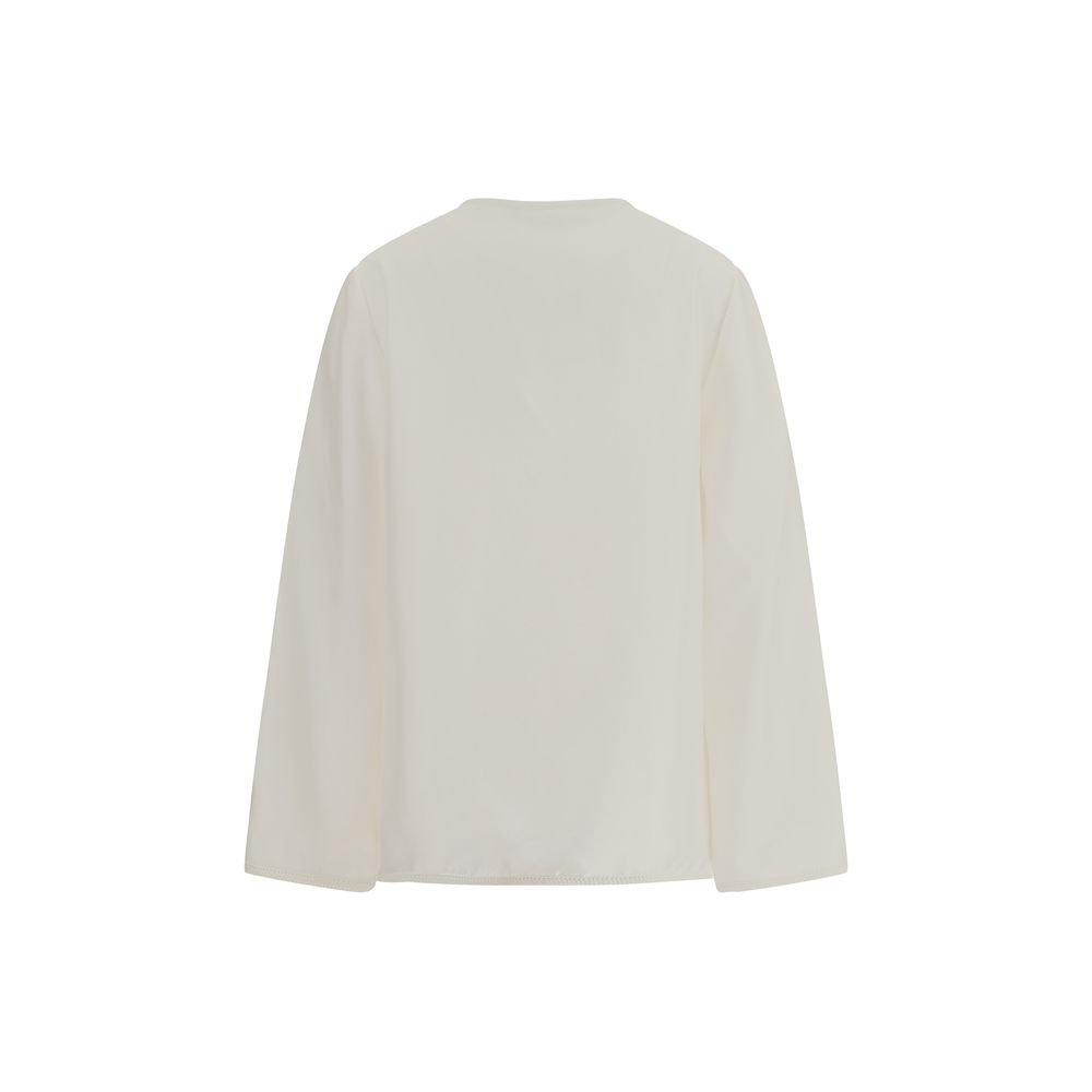 Courrėges Courrèges Polo With Twisted Detail Glam Steals