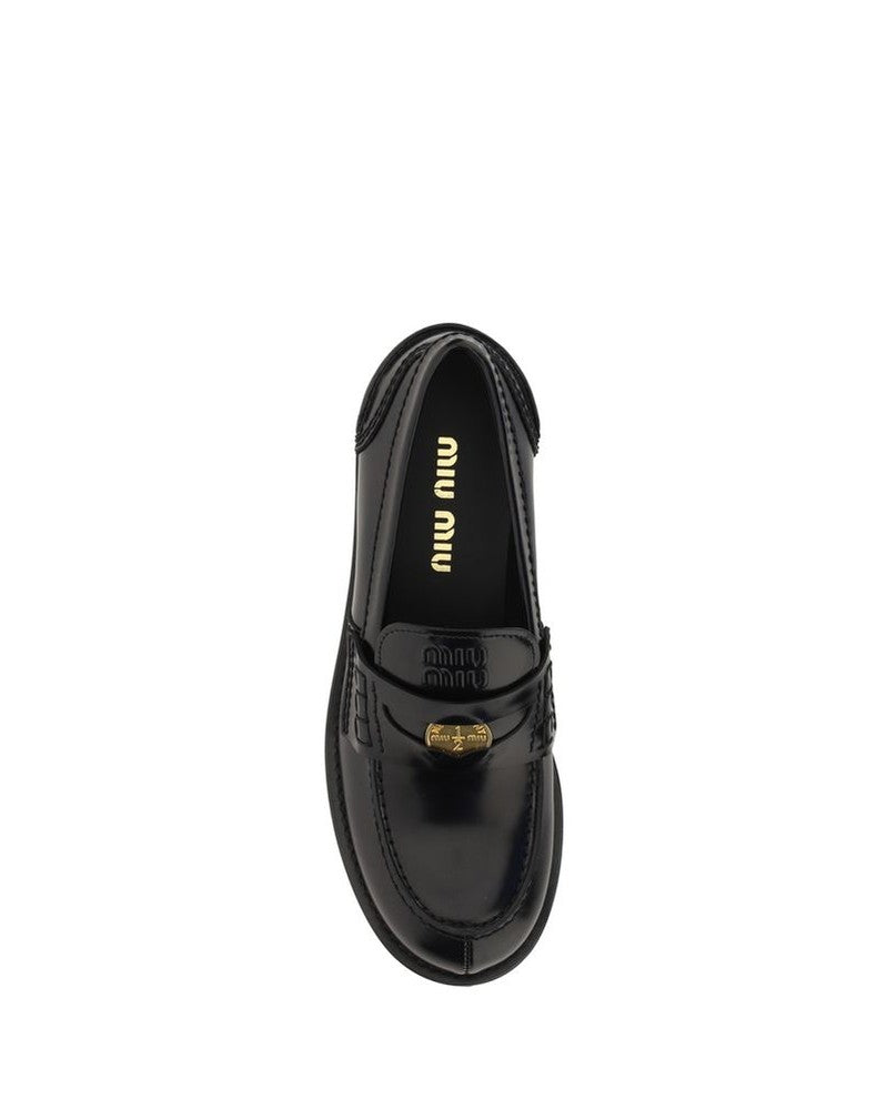Miu Miu Black Rubber Slip On Loafers Glam Steals