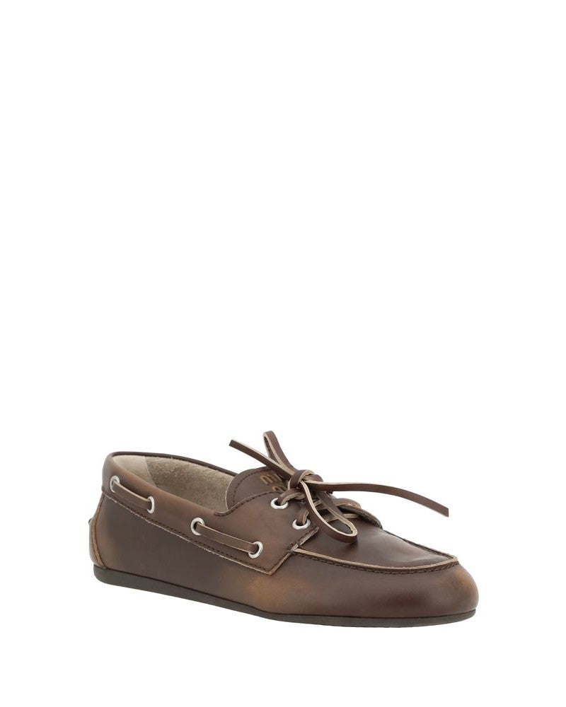 Miu Miu Brown Calf Leather Bos Taurus Slip On Loafers Glam Steals